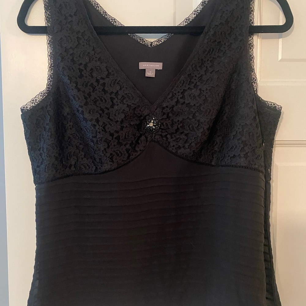 Black sleeveless dressy top w black Crystal accent